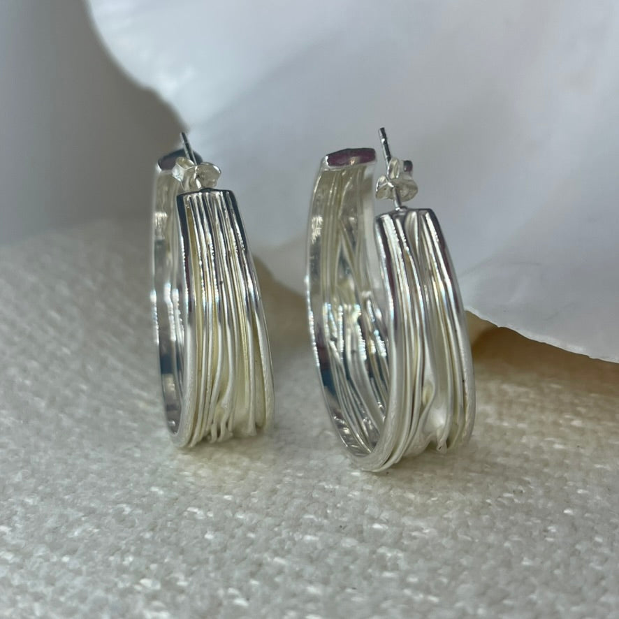 Bondi earrings with the most beartiful texture of flowing silver,